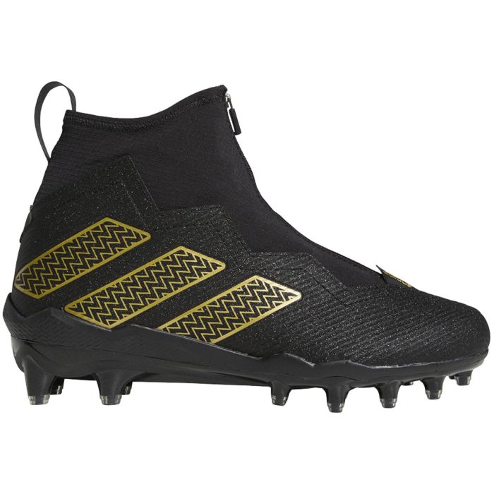 black and gold nike football cleats