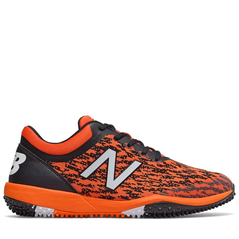 New balance store orange turf shoes